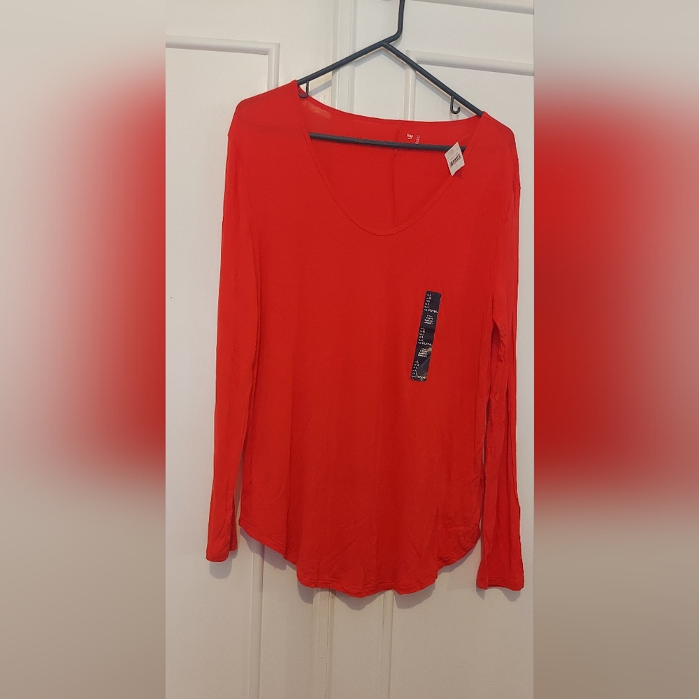 Women top, color red size large.